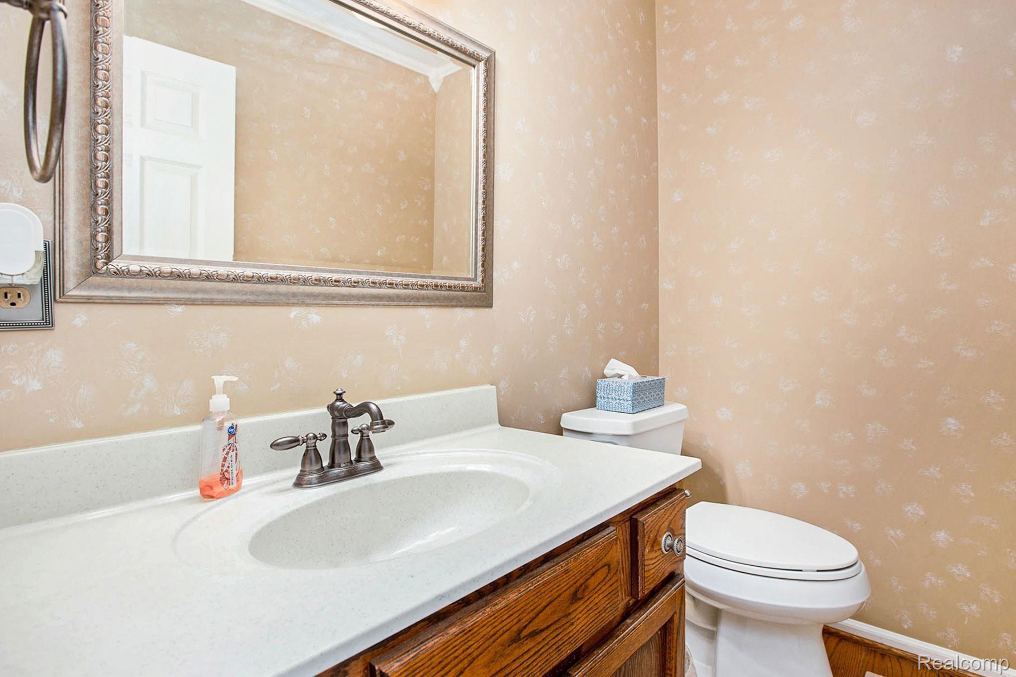 9500 Gibbs Road Clarkston, MI 48348 - Photo 19 of 30 Main floor half bath