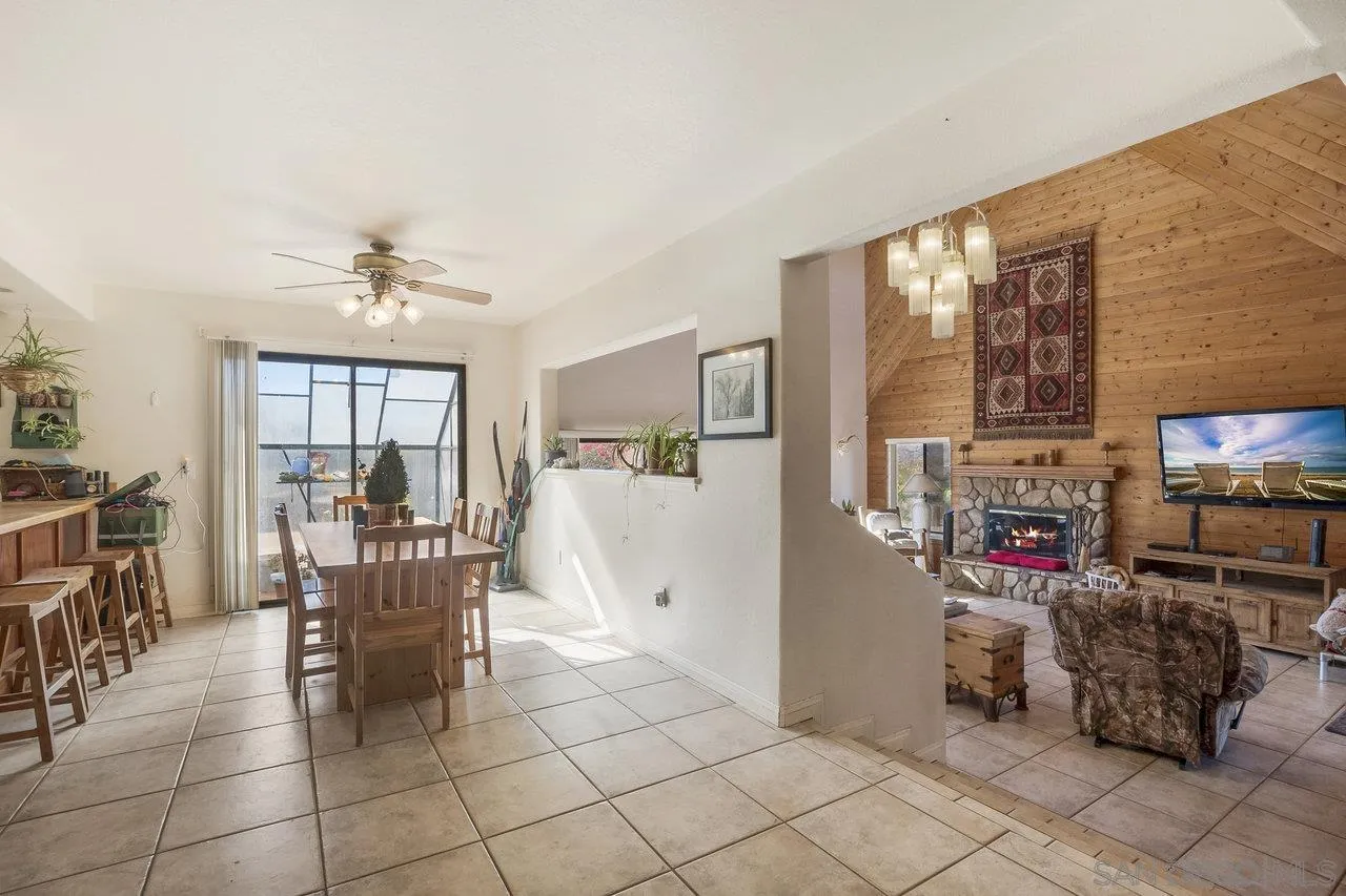 18995 Highway 94 Dulzura, CA 91917 - Photo 13 of 55 a view of a livingroom with furniture and a flat screen tv