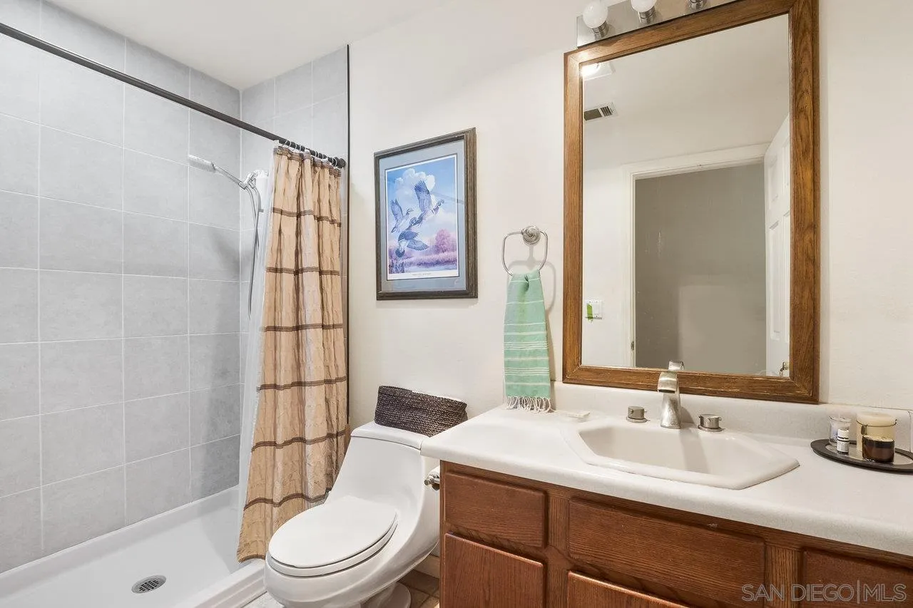 18995 Highway 94 Dulzura, CA 91917 - Photo 21 of 55 a bathroom with a sink toilet and shower
