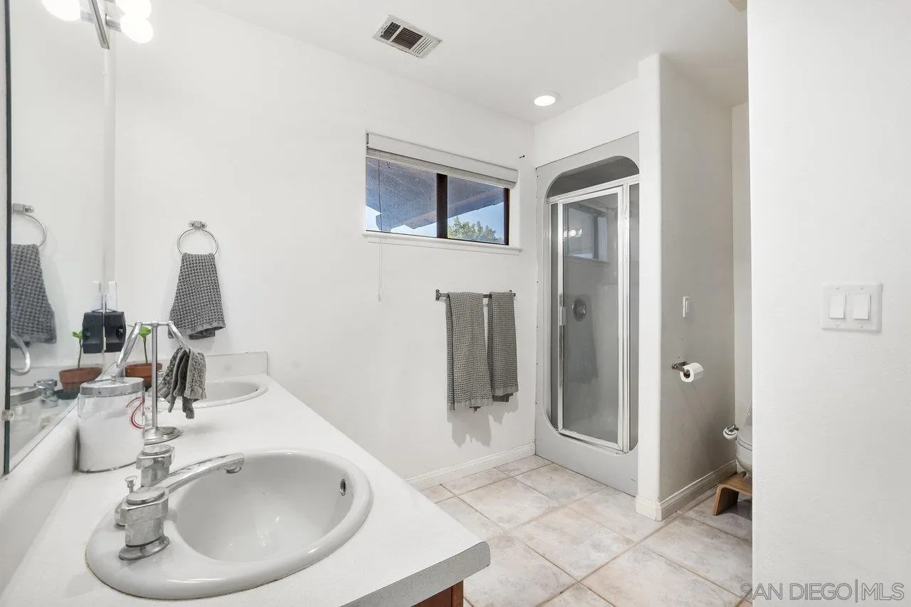 18995 Highway 94 Dulzura, CA 91917 - Photo 28 of 55 a bathroom with a sink and a mirror