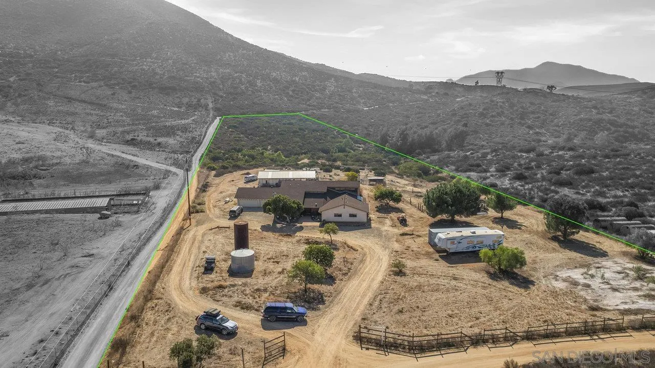 18995 Highway 94 Dulzura, CA 91917 - Photo 3 of 55 a view of a house with a yard