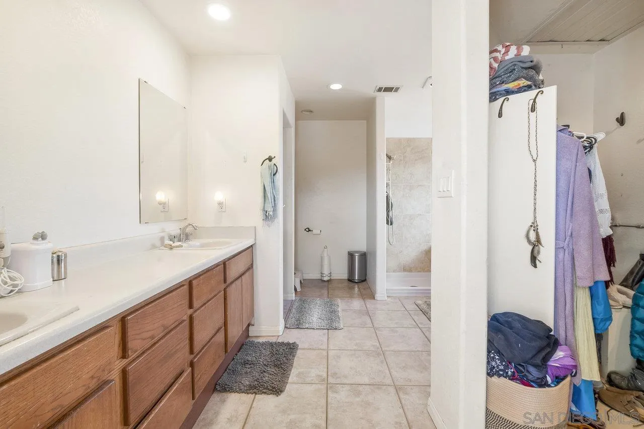 18995 Highway 94 Dulzura, CA 91917 - Photo 34 of 55 a bathroom with a sink and a mirror