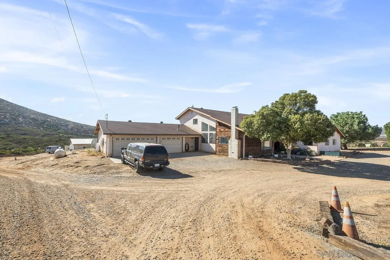 18995 Highway 94 Dulzura, CA 91917 - Photo 4 of 55 a view of a house with a snow in the background