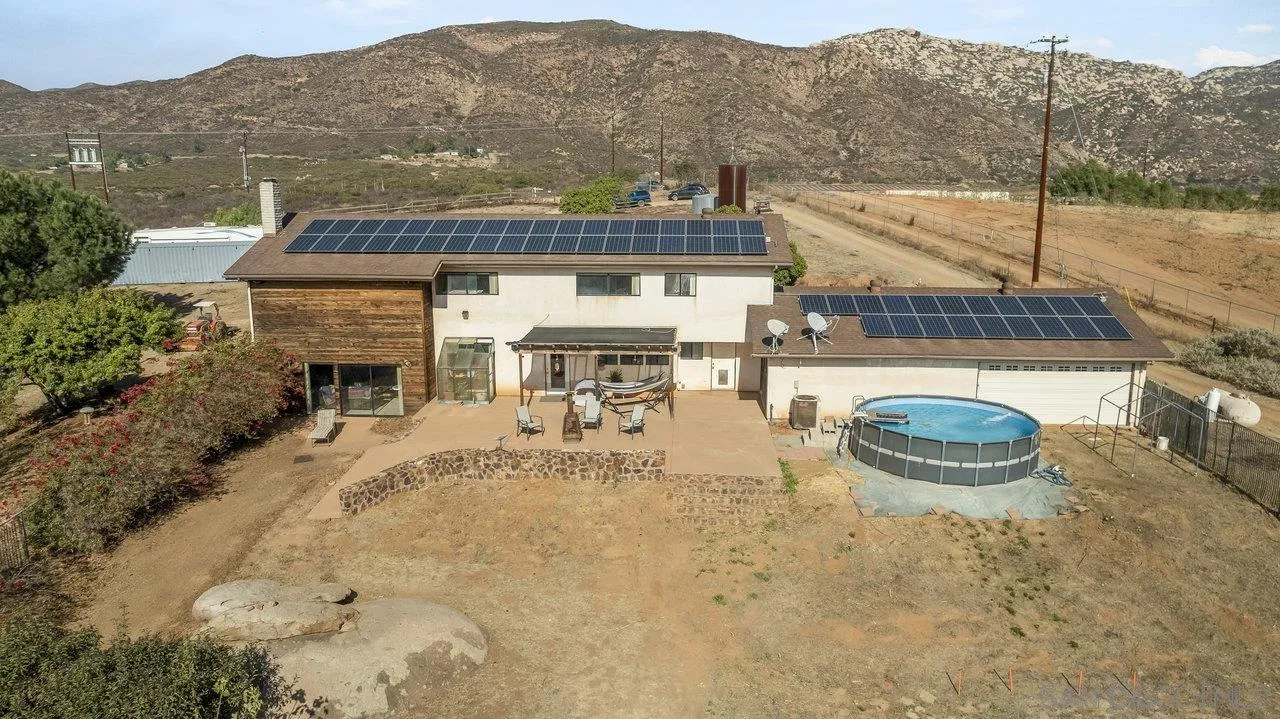 18995 Highway 94 Dulzura, CA 91917 - Photo 42 of 55 an aerial view of a house with a yard and sitting space