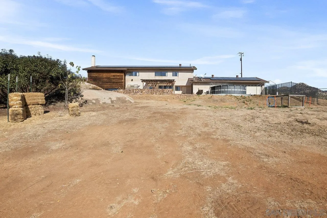 18995 Highway 94 Dulzura, CA 91917 - Photo 46 of 55 a backyard of a house with table and chairs