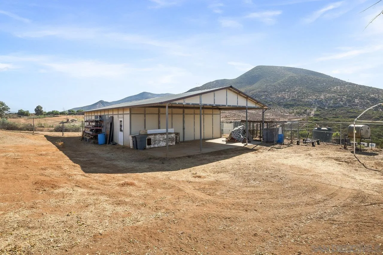 18995 Highway 94 Dulzura, CA 91917 - Photo 47 of 55 a view of a house with backyard and sitting area