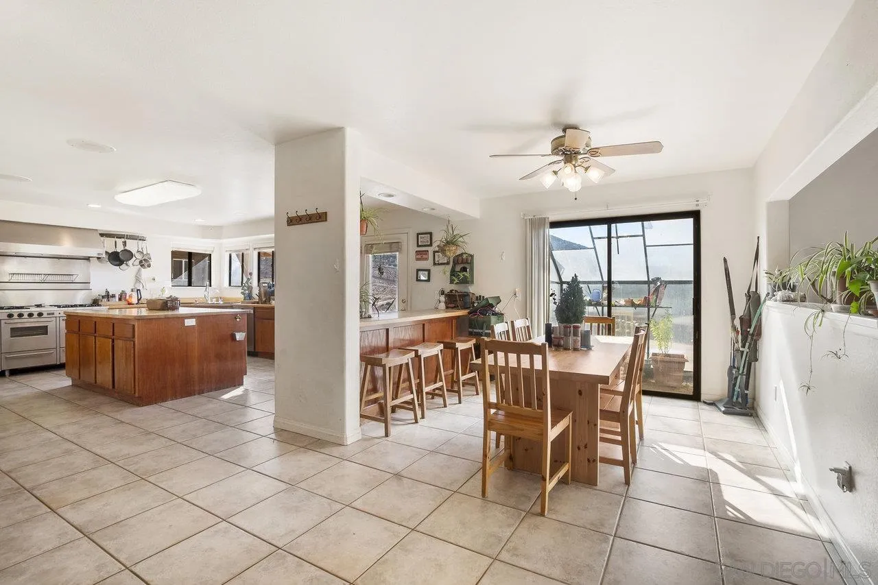 18995 Highway 94 Dulzura, CA 91917 - Photo 7 of 55 a view of a dining room and livingroom with furniture