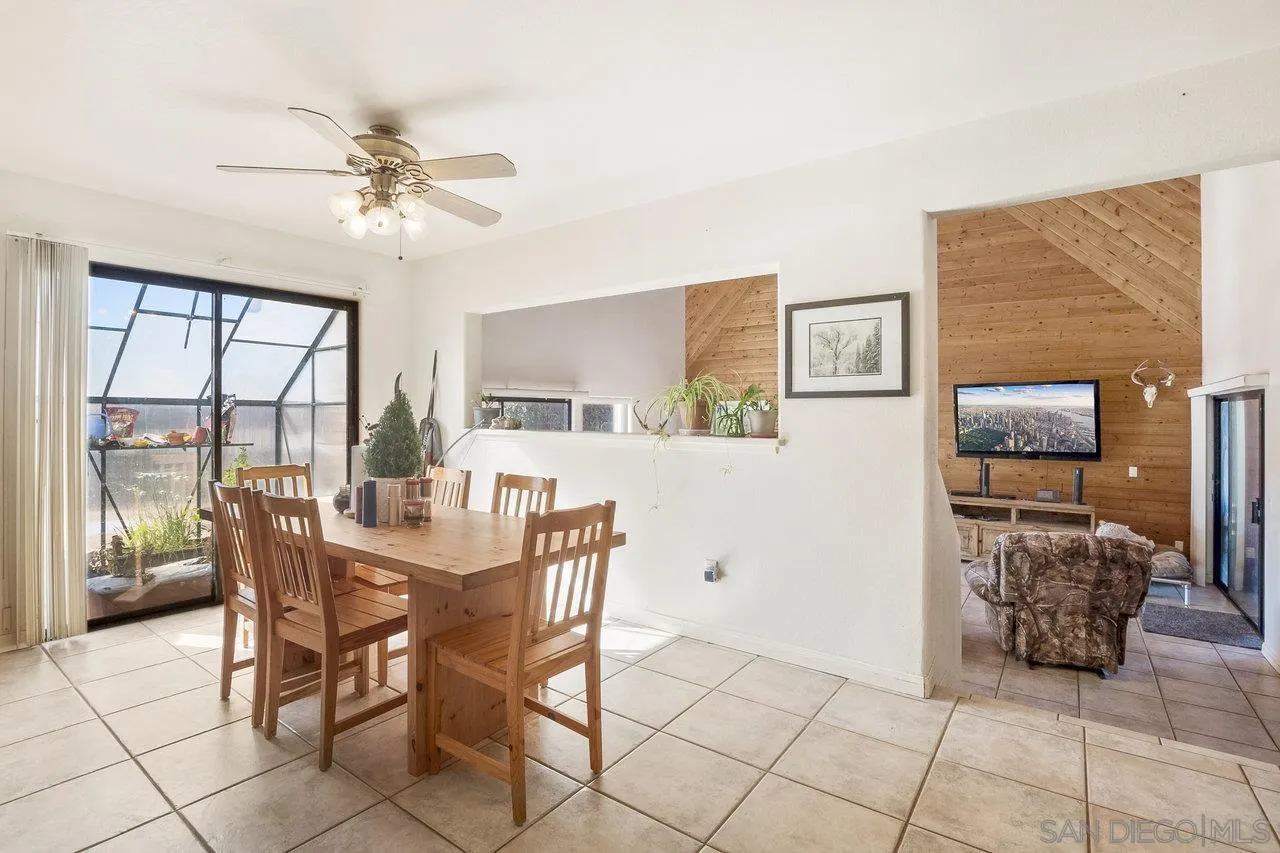 18995 Highway 94 Dulzura, CA 91917 - Photo 8 of 55 a dining room with furniture and window