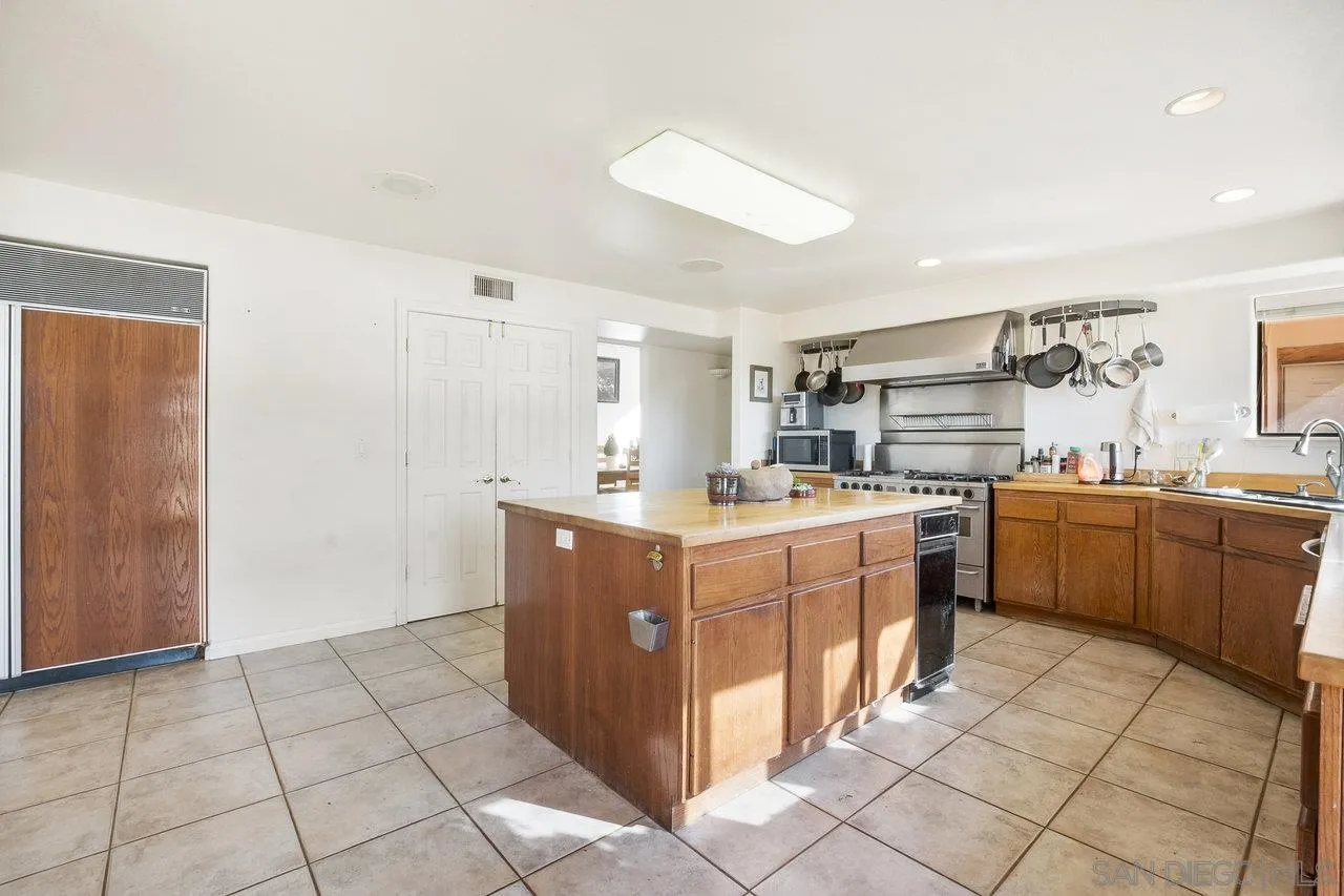 18995 Highway 94 Dulzura, CA 91917 - Photo 10 of 55 a kitchen with a sink and cabinets