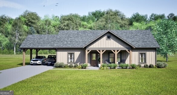 325 Farmer Lane Carnesville, GA 30521 - Photo 1 of 1 a front view of a house with a garden and trees