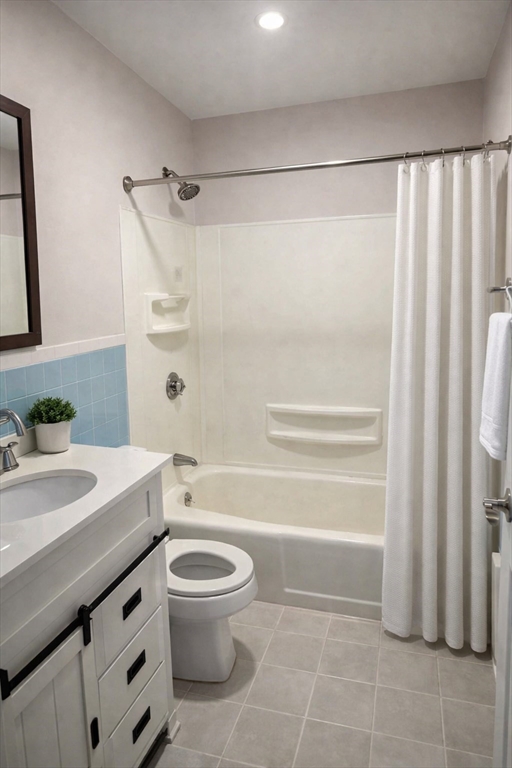 16 Cleveland Place, Unit 11 Gloucester, MA 01930 - Photo 6 of 8 a bathroom with a sink a toilet and shower