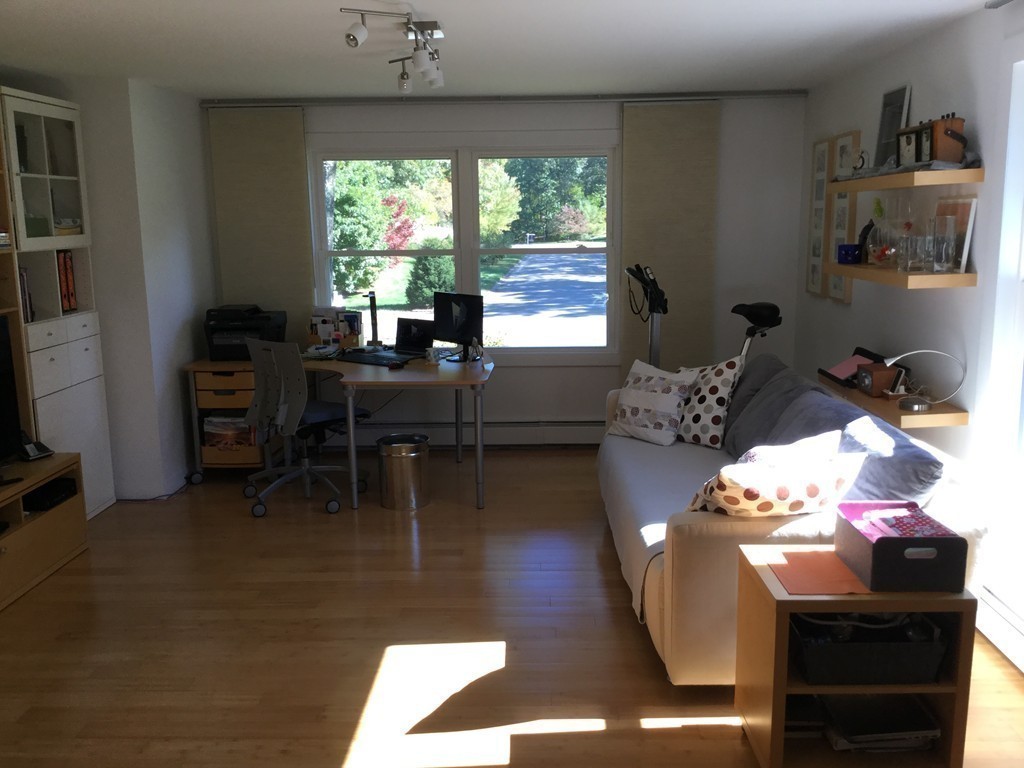5 Bear Path Clinton, MA 01510 - Photo 13 of 30 a living room with furniture dining table and a large window