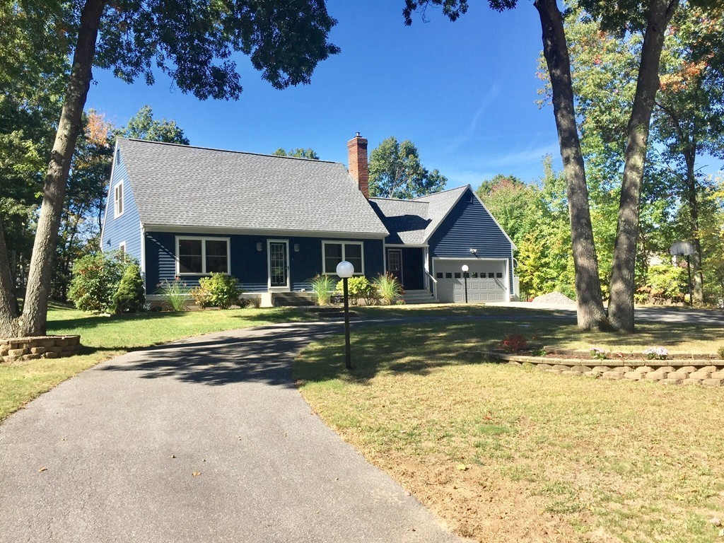 5 Bear Path Clinton, MA 01510 - Photo 2 of 30 a view of a house with swimming pool and a yard