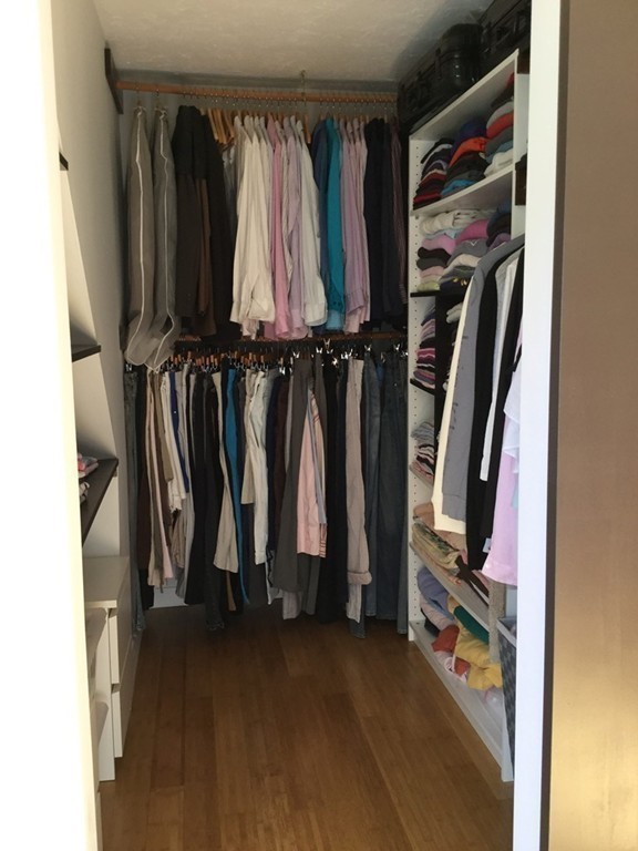 5 Bear Path Clinton, MA 01510 - Photo 22 of 30 a view of walk in closet with clothes