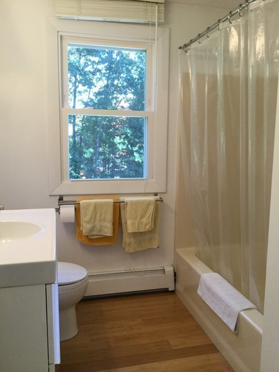 5 Bear Path Clinton, MA 01510 - Photo 23 of 30 a bathroom with a toilet and a bathtub