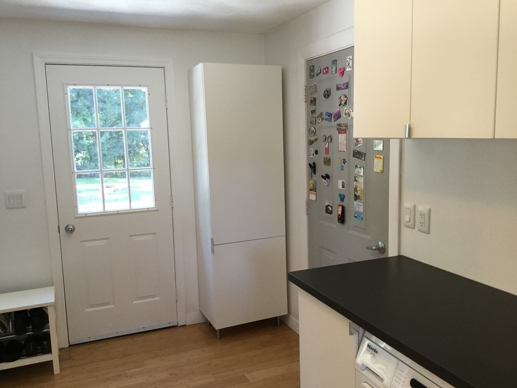 5 Bear Path Clinton, MA 01510 - Photo 5 of 30 an empty room with wooden floor and cabinet