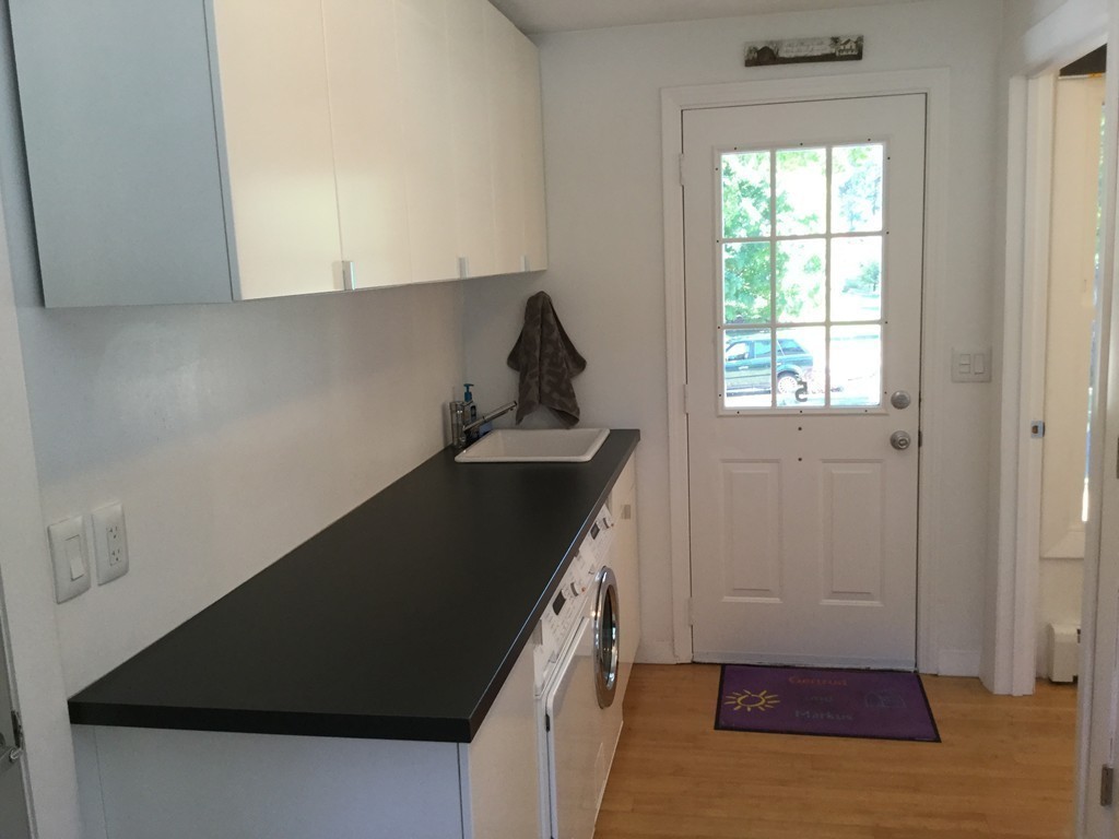 5 Bear Path Clinton, MA 01510 - Photo 6 of 30 a kitchen with a sink and cabinets