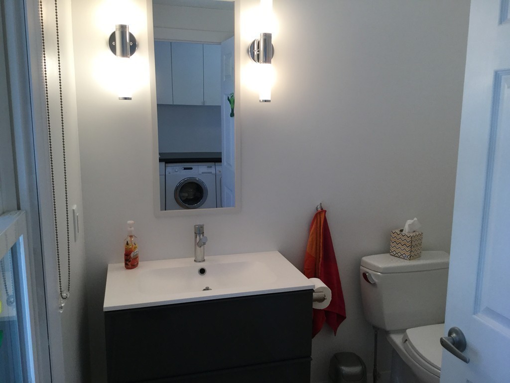 5 Bear Path Clinton, MA 01510 - Photo 7 of 30 a bathroom with a sink mirror and toilet