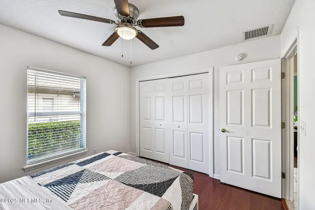 a bathroom with a sink vanity granite and a mirror