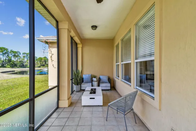 a view of a house with backyard and garden