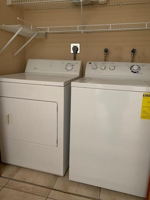 1950 Southwest 121st Court, Unit 240 Miami, FL 33175 - Photo 19 of 27 a utility room with dryer and washer