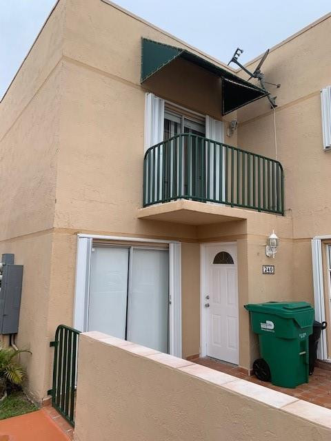 1950 Southwest 121st Court, Unit 240 Miami, FL 33175 - Photo 24 of 27 a view of front door and deck