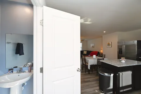 a bathroom with a sink and a mirror