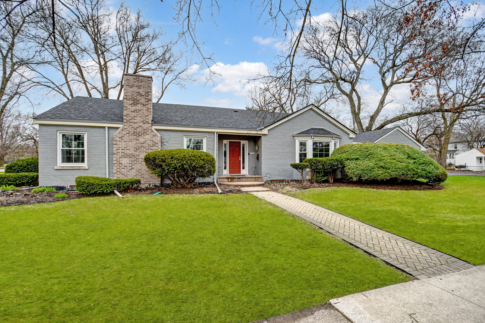 2425 Flossmoor Road Flossmoor, IL 60422 - Photo 1 of 21 a front view of a house with a garden