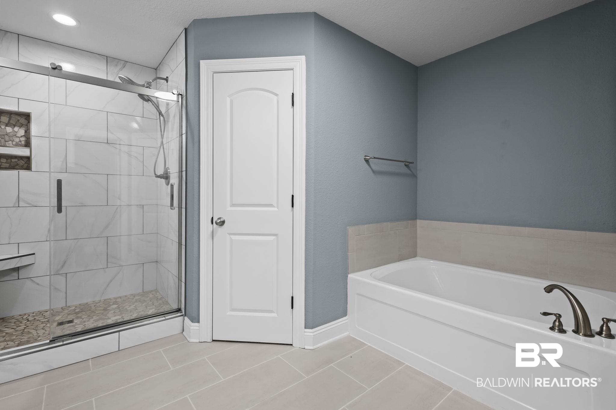 8781 Baptist Camp Road Elberta, AL 36530 - Photo 6 of 44 Full bathroom with a stall shower, tile patterned flooring, baseboards, and a bath