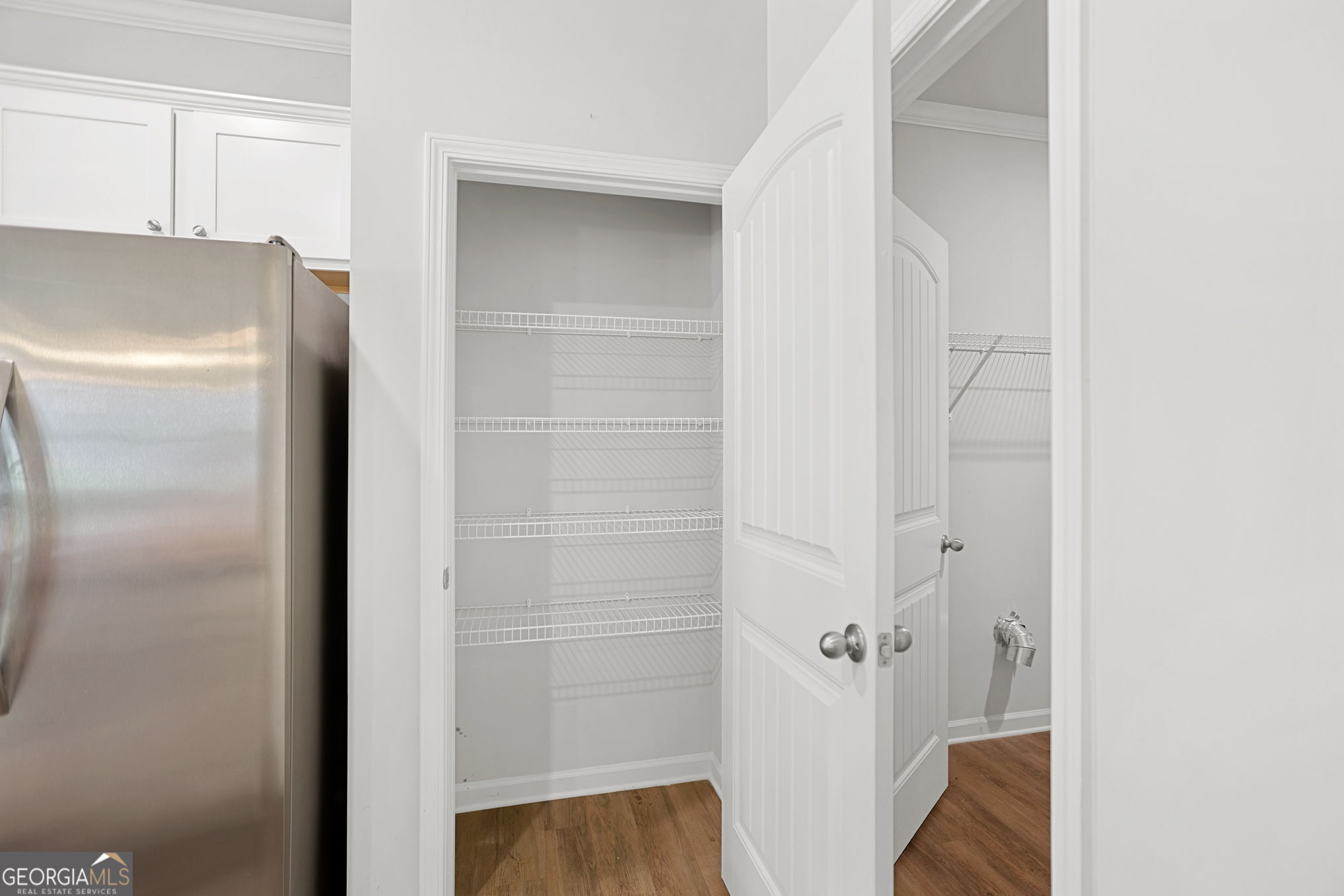 4605 Dandelion Way Cumming, GA 30040 - Photo 31 of 54 a bathroom with a bathtub