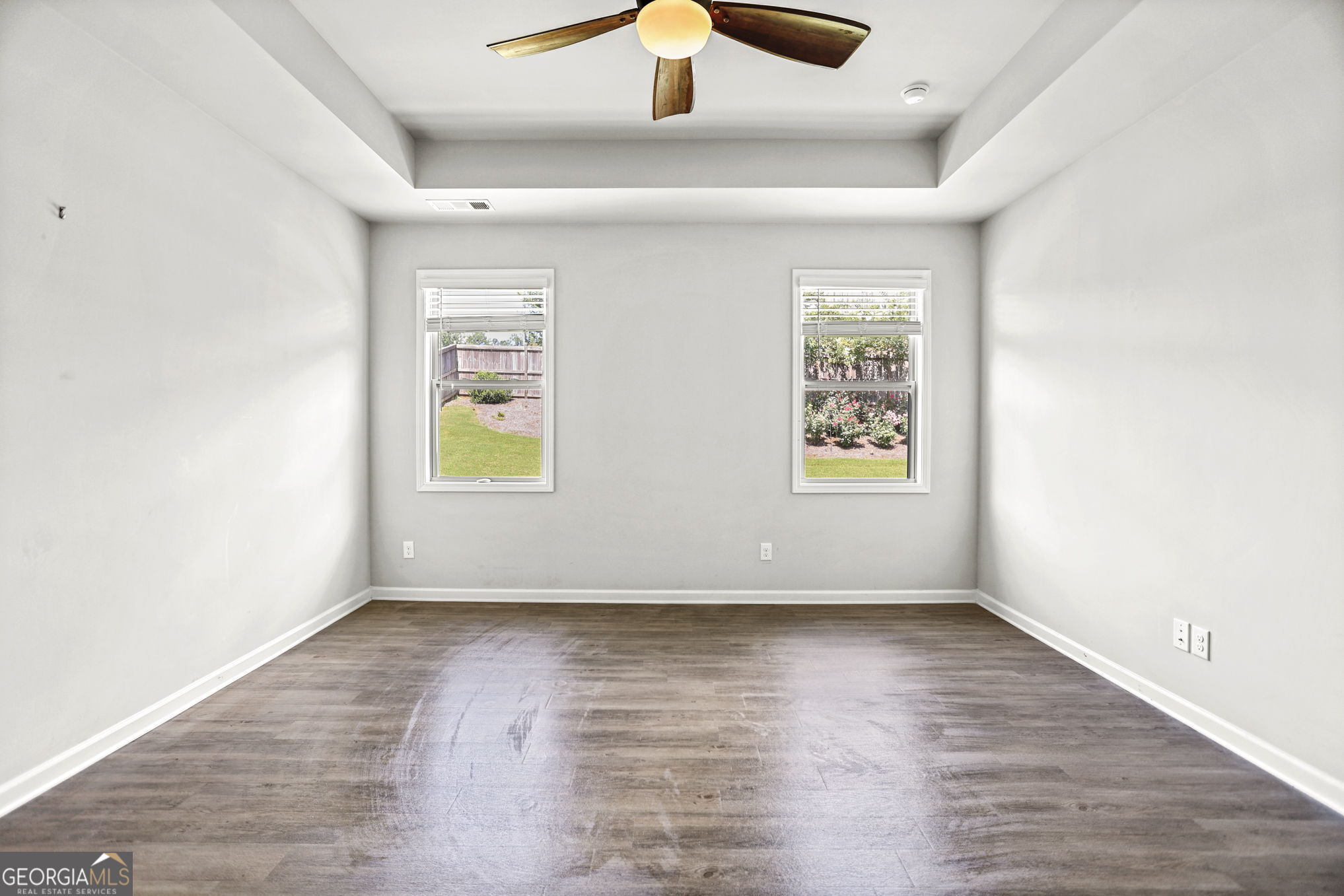 4605 Dandelion Way Cumming, GA 30040 - Photo 39 of 54 wooden floor in an empty room