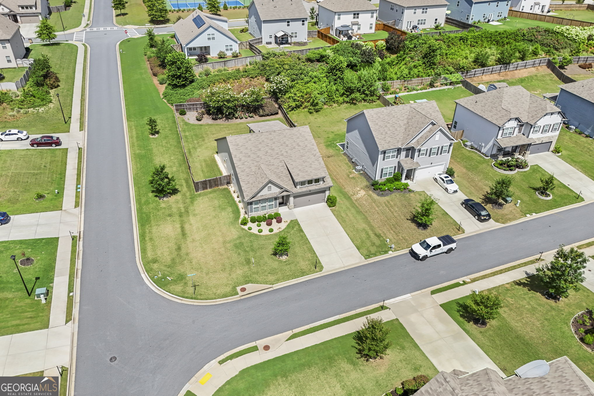 4605 Dandelion Way Cumming, GA 30040 - Photo 50 of 54 an aerial view of a house having swimming pool garden and patio