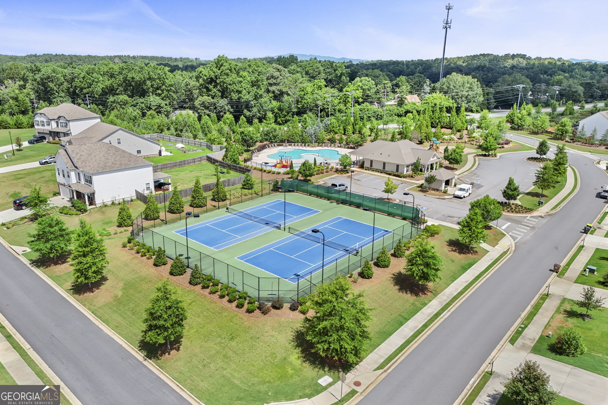 4605 Dandelion Way Cumming, GA 30040 - Photo 51 of 54 an aerial view of a house