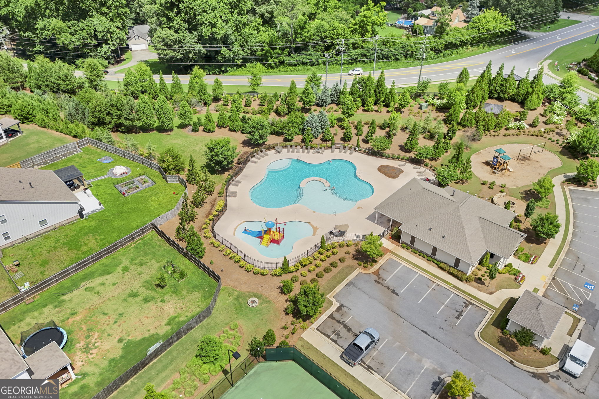 4605 Dandelion Way Cumming, GA 30040 - Photo 53 of 54 an aerial view of a house yard swimming pool and outdoor seating