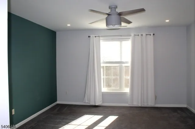 en empty room with windows