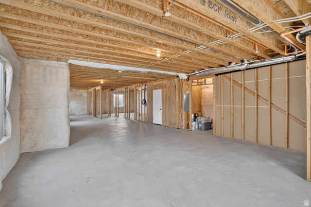 1257 North 1350th Street East Mapleton, UT 84664 - Photo 18 of 31 Unfinished basement featuring exposed wood joists and subflooring, concrete flooring, and partial framing for future customization
