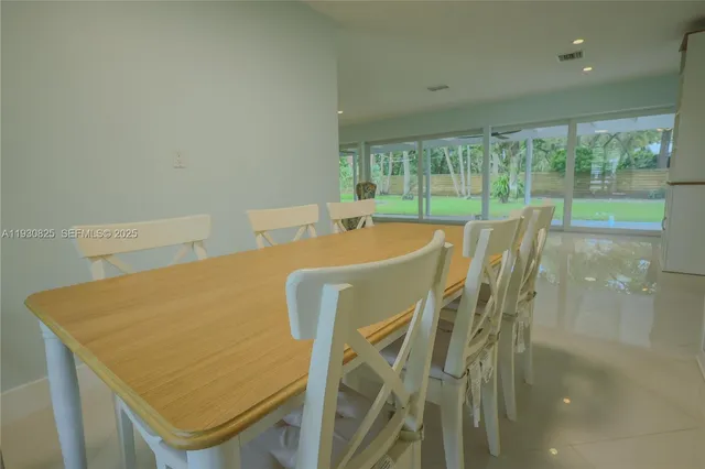 a view of a workspace with furniture