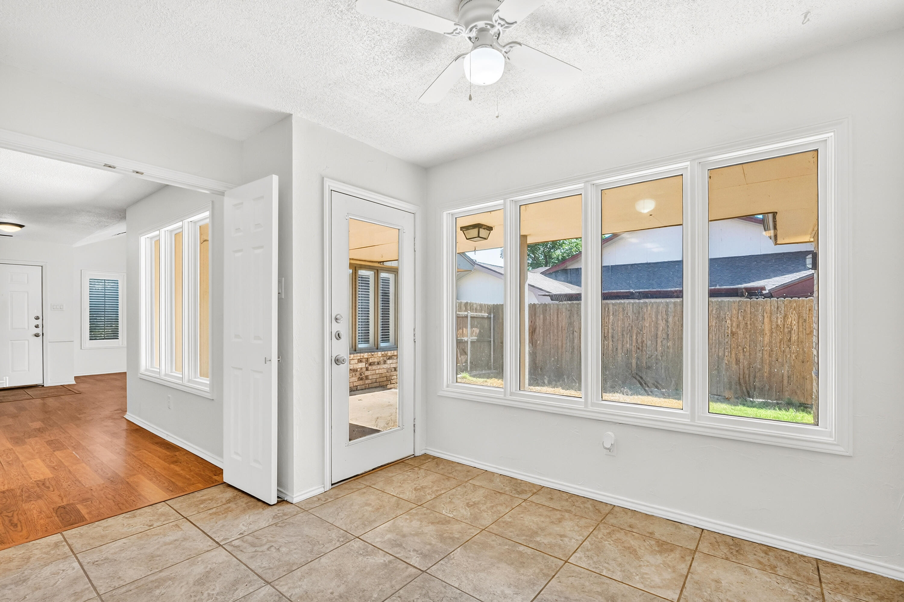 5221 84th Street Lubbock, TX 79424 - Photo 11 of 26 a view of an empty room with a window