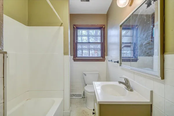 a bathroom with a sink and a bathtub