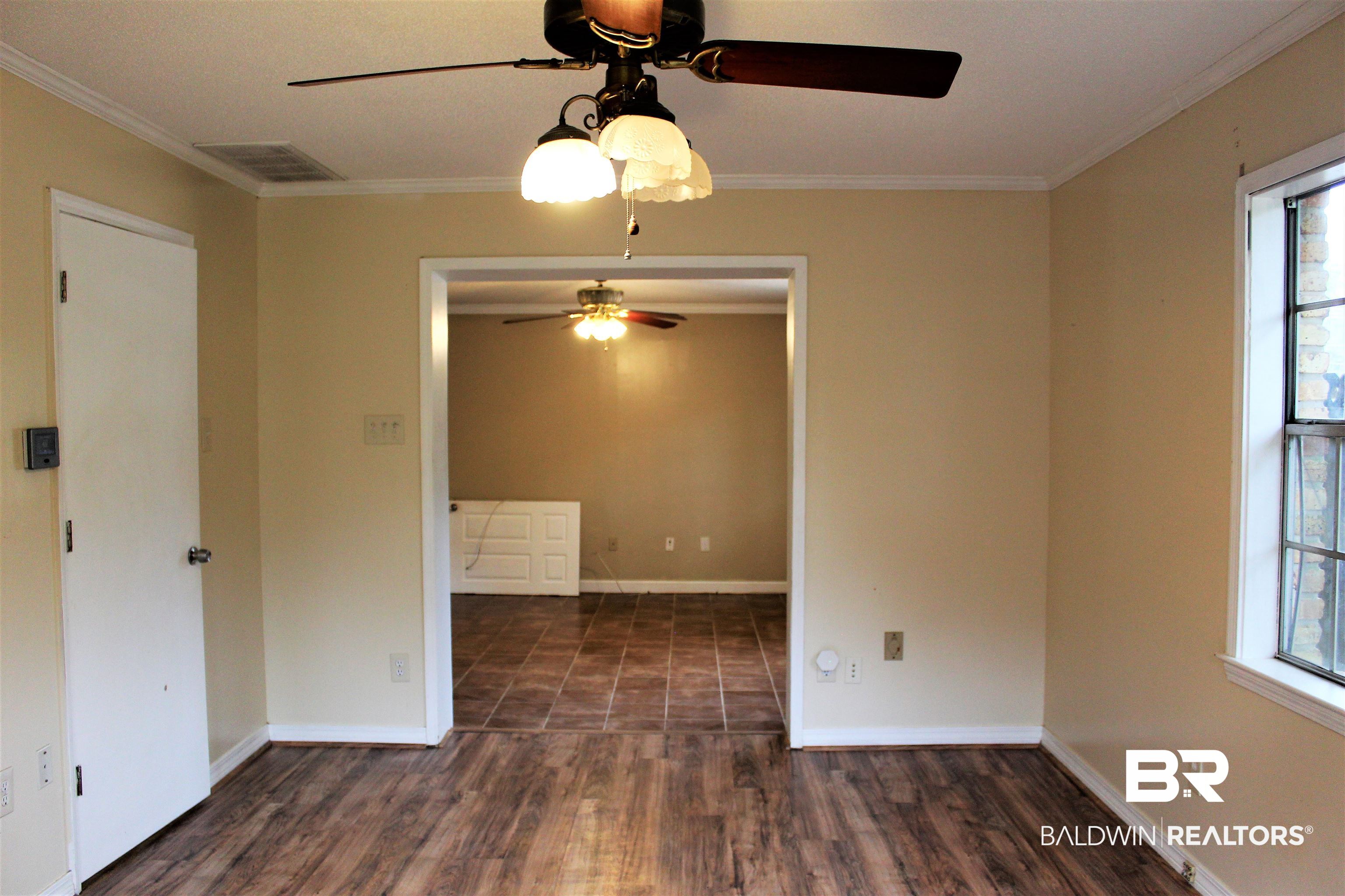 4251 Schillinger Road South Mobile, AL 36619 - Photo 22 of 38 MIL Suite Bedroom with large walk in closet