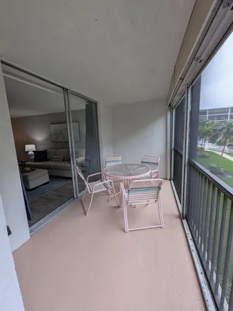 a view of a living room and furniture