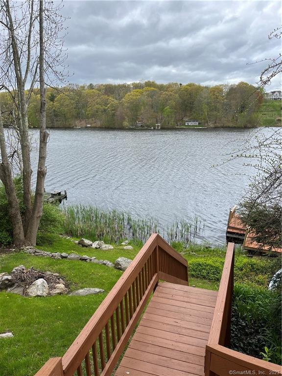 a view of a lake with a big yard