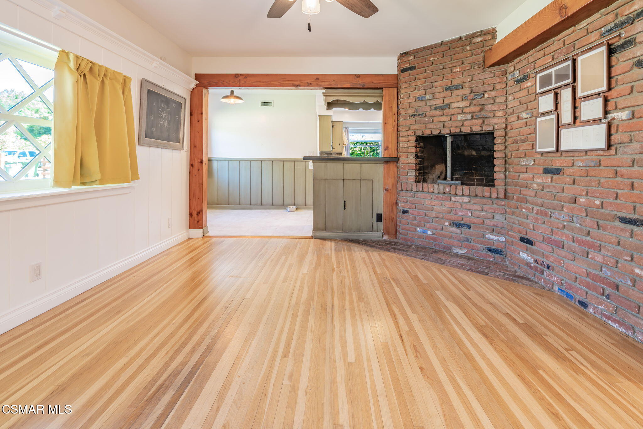 4310 Eve Road Simi Valley, CA 93063 - Photo 13 of 50 a view of an empty room with a window and wooden floor