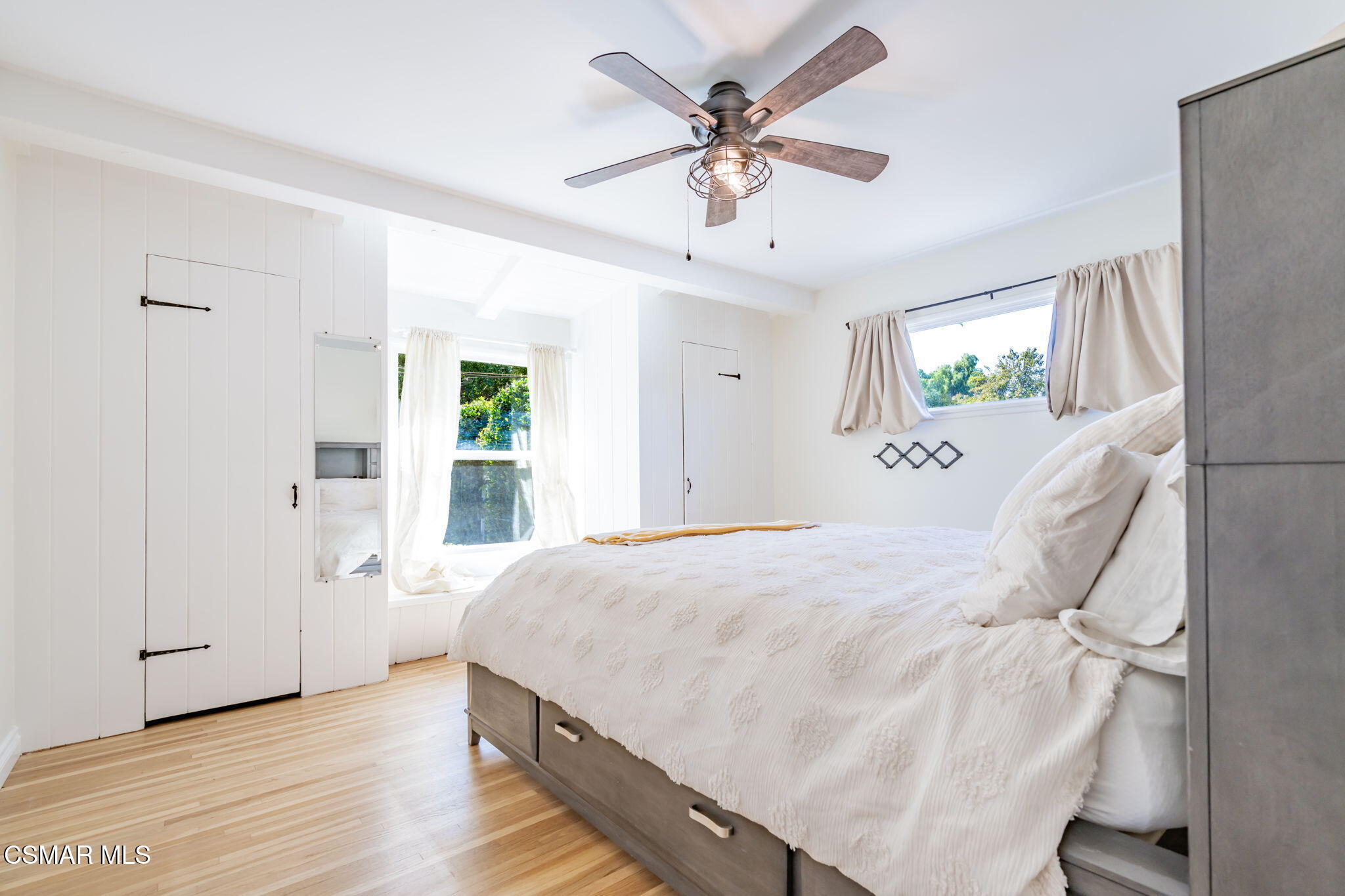 4310 Eve Road Simi Valley, CA 93063 - Photo 23 of 50 a spacious bedroom with a bed and a chandelier