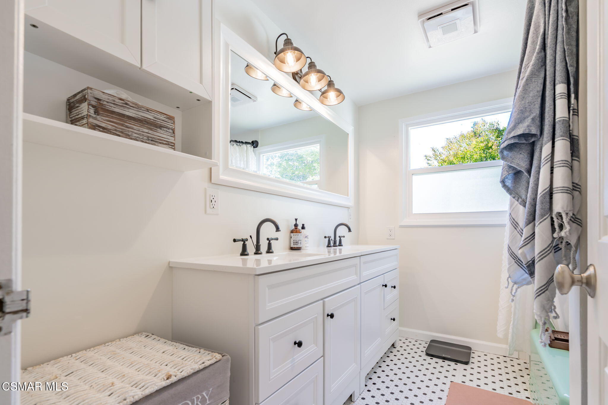 4310 Eve Road Simi Valley, CA 93063 - Photo 25 of 50 a bathroom with a sink and a mirror