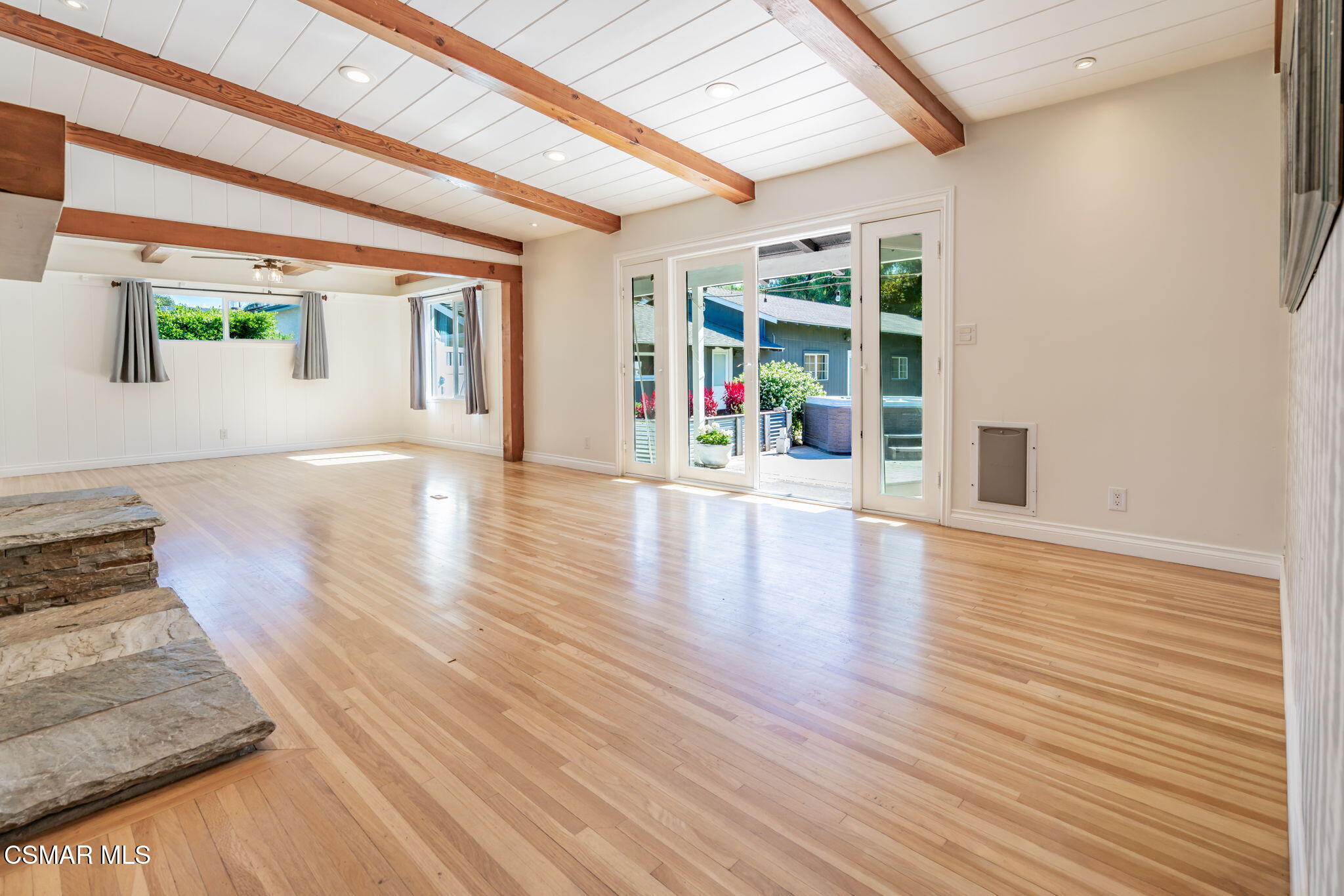 4310 Eve Road Simi Valley, CA 93063 - Photo 7 of 50 a view of an empty room with wooden floor and a window