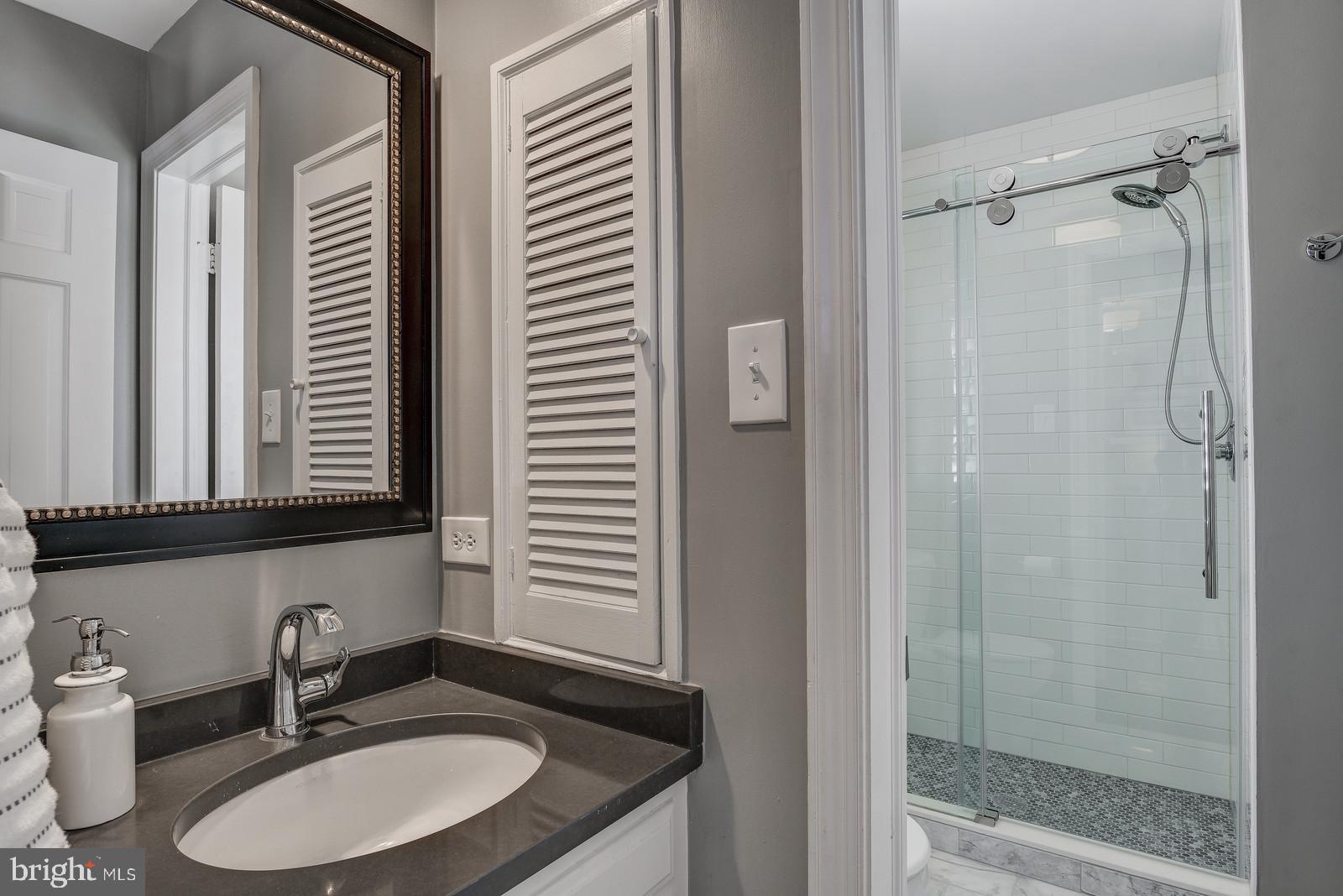 8206 Burning Tree Road Bethesda, MD 20817 - Photo 14 of 37 Main level en suite bath