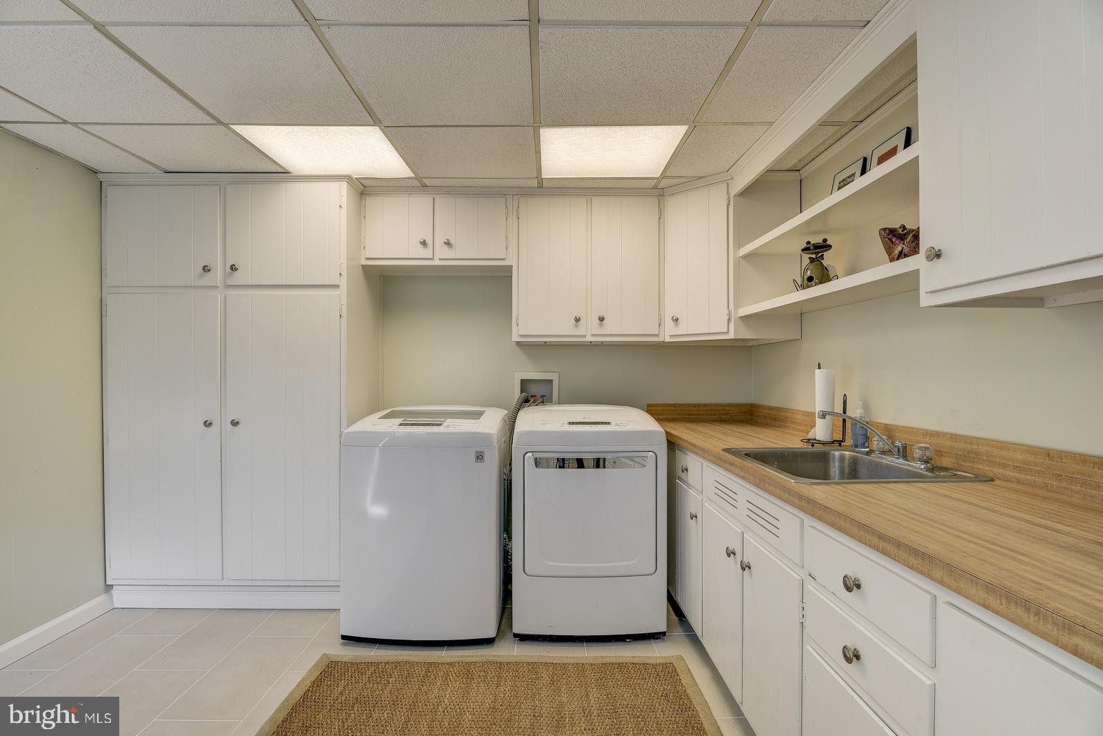 8206 Burning Tree Road Bethesda, MD 20817 - Photo 25 of 37 Large lower level laundry offer plenty of storage