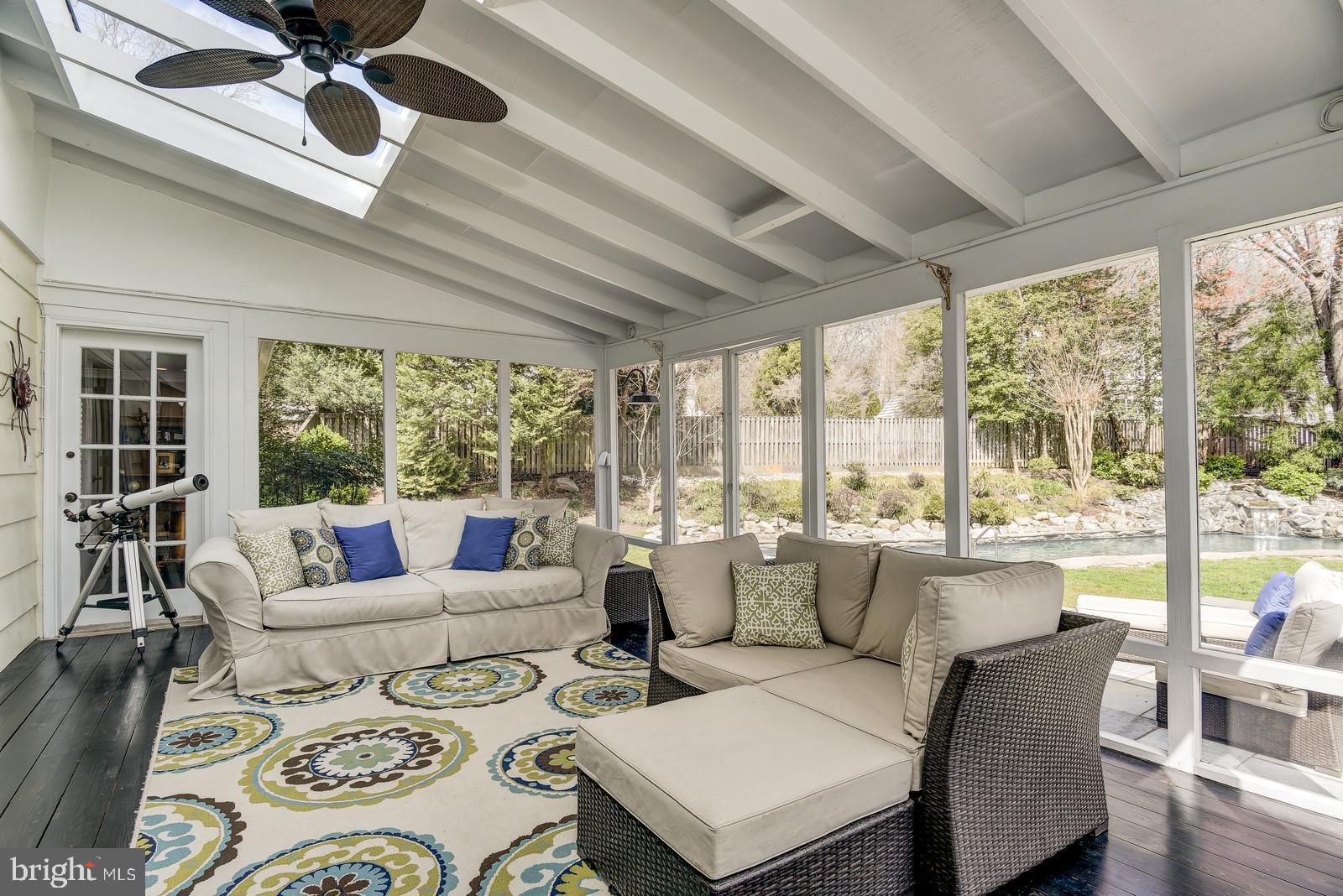 8206 Burning Tree Road Bethesda, MD 20817 - Photo 28 of 37 Large screened in porch overlooks serene backyard