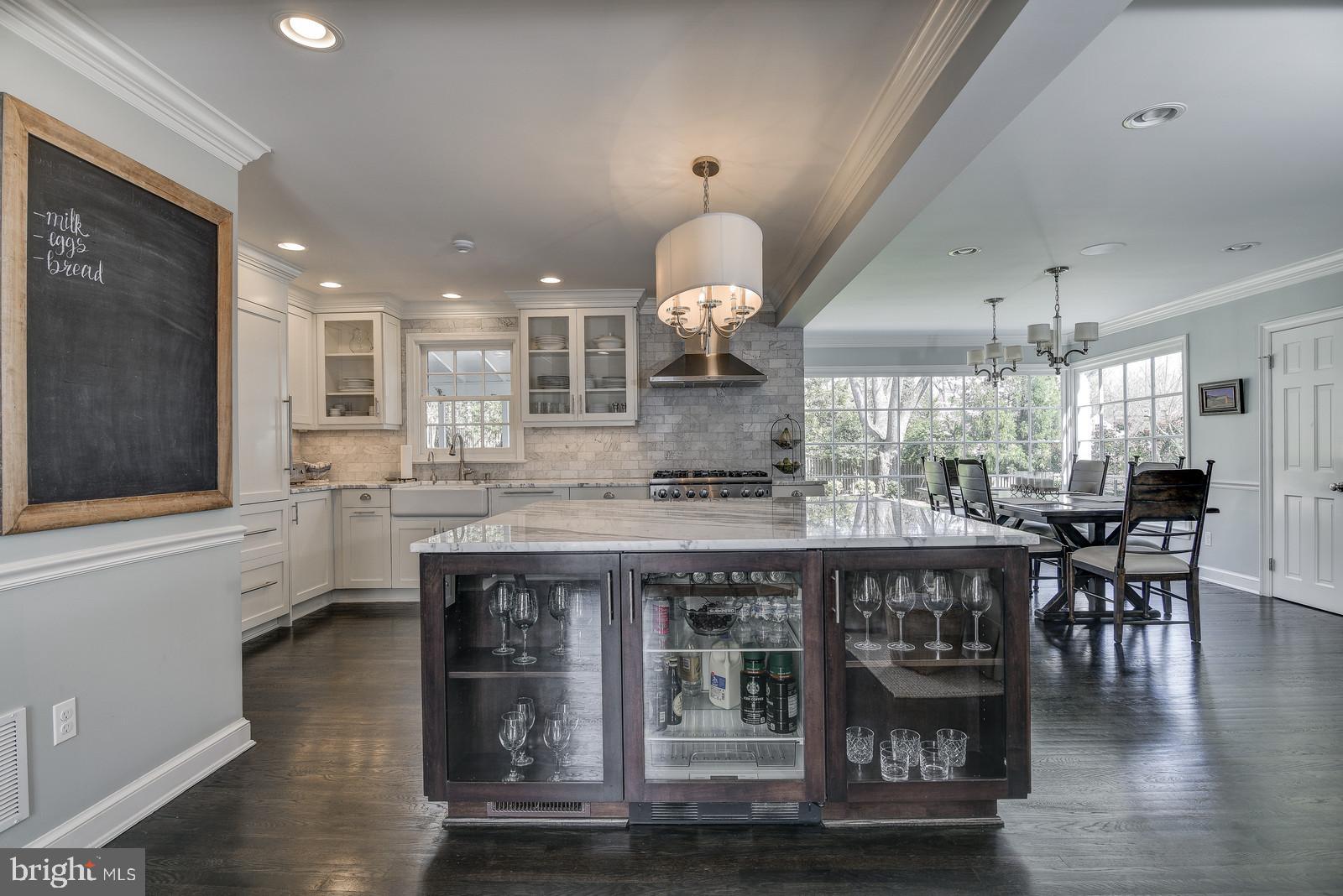 8206 Burning Tree Road Bethesda, MD 20817 - Photo 9 of 37 Island provides wine fridge & plenty of storage